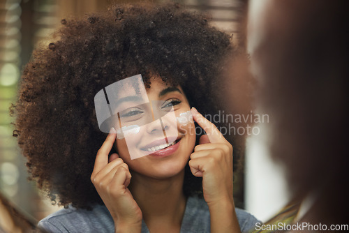 Image of Self care, cream and skincare with woman in mirror for product, facial and cosmetics. Morning routine, reflection and beauty with face of female person and lotion at home for sunscreen and glow