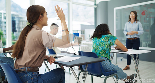 Image of Student, question and woman in a classroom with lecture and studying for college. University class, learning and students with education professor and teacher on campus with a school group at desk