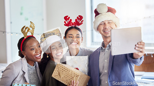 Image of Christmas, selfie and tablet with business people in office for social media, celebration and xmas. Festive, holiday and community with friends at party for team building, diversity and support