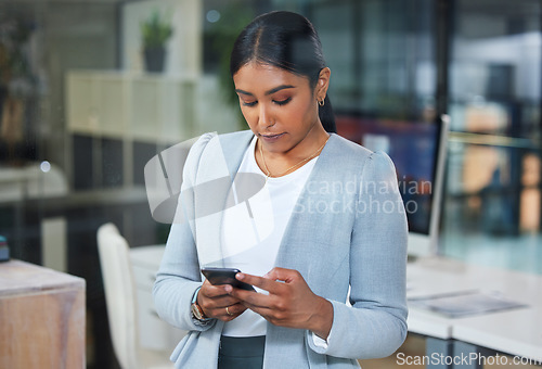 Image of Phone, corporate and business woman typing an email or search the internet, web and website in an office. Smartphone, online and employee or person on social media to connect or network on mobile app