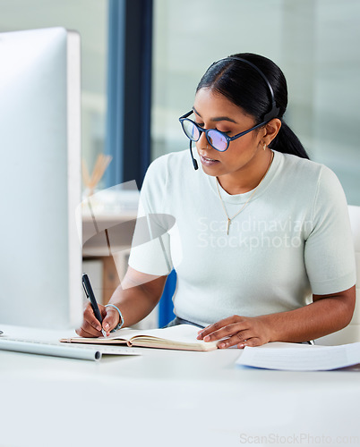 Image of Crm consultant, woman writing and call center staff in a office with telemarketing information. Worker, online management and document of a phone agent learning about company process tech at desk