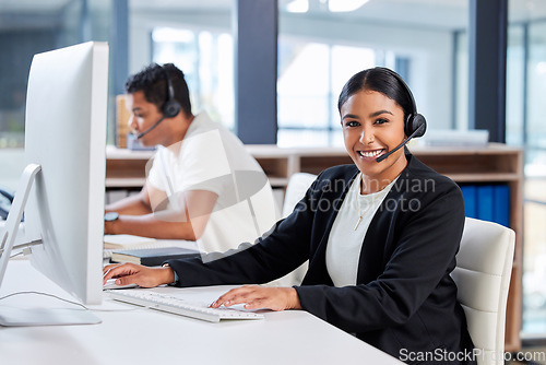 Image of Call center, customer service and portrait of a woman consultant in the office for crm communication. Contact us, technology and female telemarketing agent working on online consultation with headset