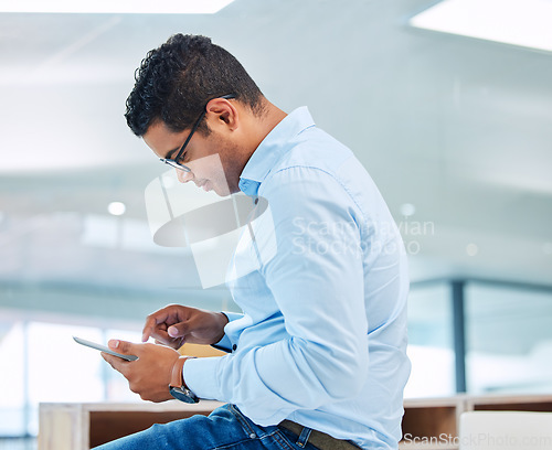 Image of Business man, tablet and browsing in office for internet connection, planning and research information. Male employee, digital technology and reading website, online data and project update on app