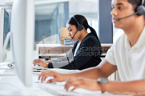 Image of Call center, customer support and female consultant in the office with crm communication. Contact us, technology and woman telemarketing agent or advisor working on online consultation with a headset