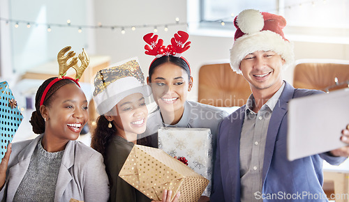 Image of Christmas, selfie and tablet with business people at party for social media, celebration and xmas. Festive, holiday and community with friends in office for team building, diversity and support