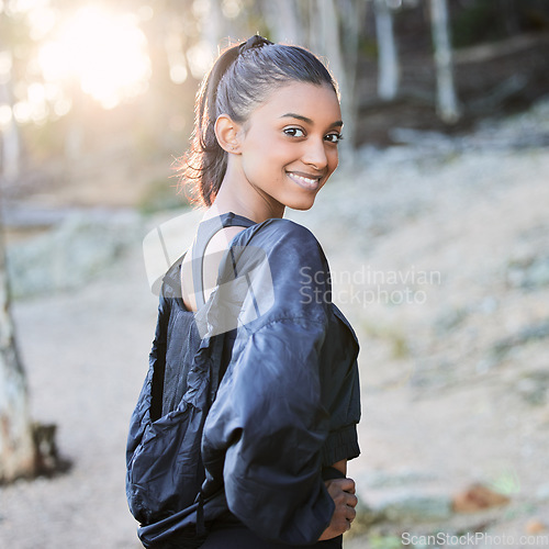 Image of Fitness, nature or portrait of happy girl running in training, exercise or workout for wellness. Runner, motivation or healthy sports woman on exercising break in forest, park or woods with smile