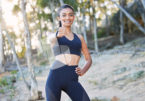 Image of Fitness, thumbs up or portrait of happy woman in nature training, running exercise or workout for wellness. Runner, motivation or healthy sports girl with thumb up in forest, park or woods with smile