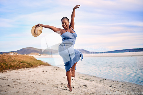 Image of Portrait, excited and black woman dancing, beach and movement with happiness, tropical island or sunset. Face, female person or girl outdoor, travel or seaside holiday for stress relief, dance or joy