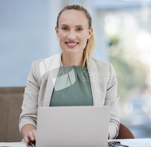 Image of Laptop, portrait and business woman working at her desk for office planning, digital agency and HR management. Human Resources professional, employee or happy face person on her computer technology