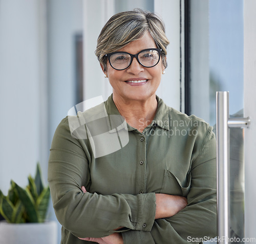 Image of Portrait, arms crossed and business woman for workplace management, career mindset and happy job. Proud face of a senior person, employee or entrepreneur in office building, door or company welcome