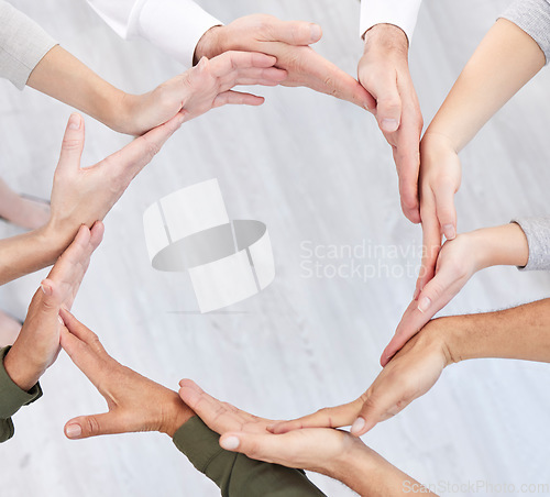Image of Circle, teamwork and synergy of people hands in collaboration, workflow and group or team building from above. Integration, formation and support, cooperation or community of women and men connection