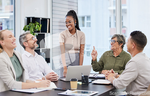 Image of Business meeting, laughing and people with manager, african woman or presenter for company planning. Happy person talking to clients in conference room, project ideas and funny discussion on laptop