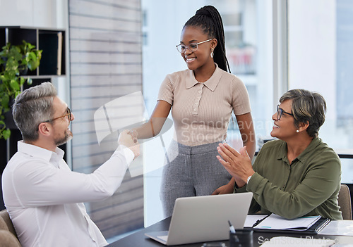 Image of Handshake, clapping and business people in meeting celebration, success or thank you of promotion. CEO, african woman or employer shaking hands in collaboration, congratulations or interview applause