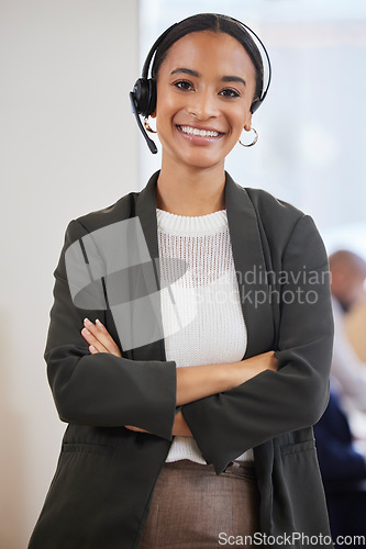 Image of Portrait, telemarketing and woman with arms crossed, call center and confident representative. Face, female person and agent with a smile, customer service and tech support with a consultant and joy