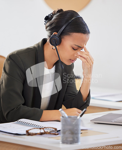 Image of Telemarketing, business and woman with a headache, stress and burnout with call center, overworked and health problem. Female person, agent or employee with a migraine, tech support and medical issue
