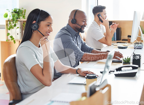 Image of Call center, customer service or support with consultant people at work in an office for assistance. Contact us, crm or consulting with a group of employees using headset technology for telemarketing