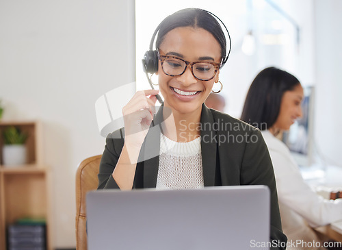 Image of Woman, microphone and laptop in call center for customer service, support and telemarketing. Face of a african female agent or consultant talk on headset for sales, crm or help desk for online advice