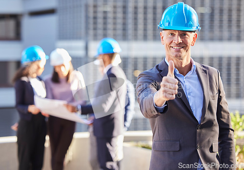 Image of Businessman, architect and thumbs up in construction for success, winning or teamwork on site. Portrait of happy man or engineer smile with thumb emoji, yes sign or like for approval in architecture