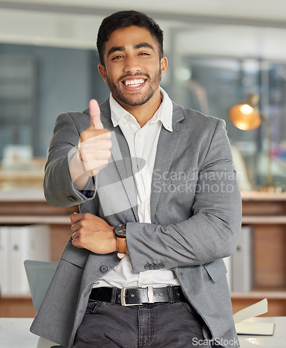 Image of Portrait, happy and business man with thumbs up in office for success, yes and thank you gesture. Face, smile and male lawyer with hand, sign and positive feedback, review or vote at startup law firm