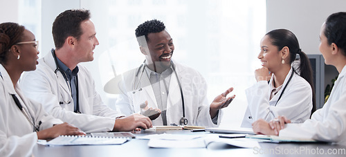 Image of Healthcare, meeting and collaboration with a team of doctors in a hospital boardroom for discussion. Medical, teamwork and planning with a group of professional medicine people working in a clinic