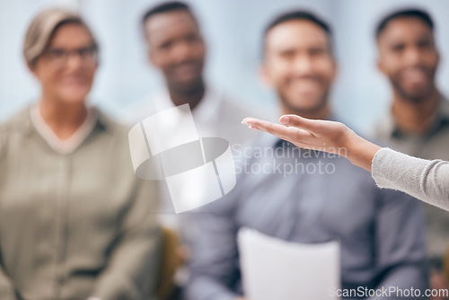 Image of Diversity, hand of leader with presentation and with colleagues in a conference room at their workplace. Meeting, speaker and woman presenter giving speech with coworkers in boardroom office at work