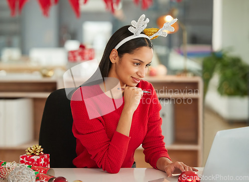 Image of Christmas, laptop and business woman thinking of gift ideas, e commerce promotion and sales in office planning. Brainstorming, choice or decision of african person working on computer for job holiday