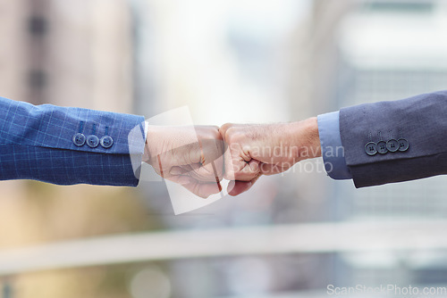 Image of Fist bump, business people and motivation of staff with success, agreement and partnership. Team work, collaboration and deal of businessman with a greeting and welcome hand gesture with partner