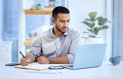 Image of Young business man, writing and notebook with laptop, ideas or schedule planning at web design job. Businessman, book and computer with notes, brainstorming or problem solving for report in workplace