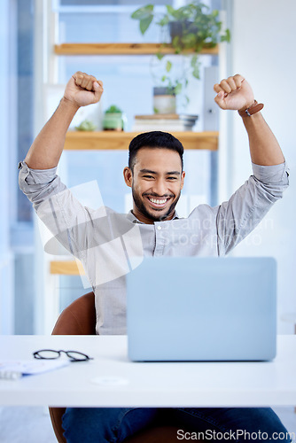Image of Happy man, laptop and celebrate business success or win at desk with victory fist for bonus deal. Excited Asian male entrepreneur with tech for profit, competition or online achievement notification