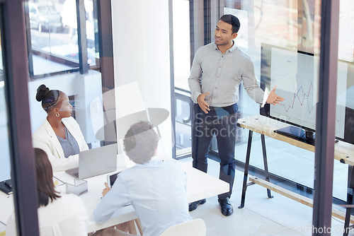 Image of Businessman, meeting and coaching on screen for data, graph or chart in team presentation at office. Man, coach or mentor training staff on corporate statistics, analytics or marketing at workplace