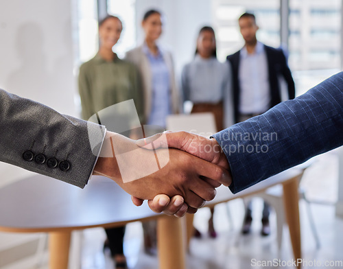 Image of B2b meeting, shaking hands and business people in office for deal, agreement or startup opportunity. Hand shake, partnership and welcome, businessman shaking hands with boss for onboarding support.