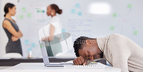 Image of Office, black man at desk sleeping with laptop and burnout, overworked on business project with stress and fatigue. Sleep, work and tired African businessman with computer and paperwork at startup.