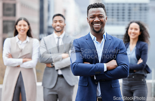 Image of Business man, city portrait and manager arms crossed outdoor with leadership and success. Professional, team and African male person with a smile from company and solidarity for corporate work