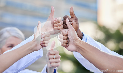 Image of Doctor, thumbs up and hands together for thank you, emoji and yes hand sign with motivation. Goal, success and collaboration of healthcare and and wellness group with winner and support gesture