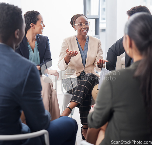 Image of Business, meeting and black woman in discussion circle for team building, planning and collaboration in office. Happy group, employees and huddle for conversation, workshop and feedback for training