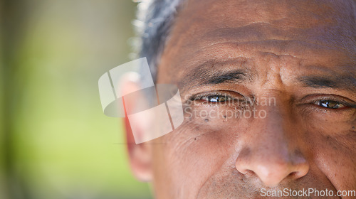 Image of Eyes, vision and closeup of elderly man, face and wisdom with focus, insight and thinking with mockup space. Old male person outdoor, perspective or point of view with eyesight and thoughtful