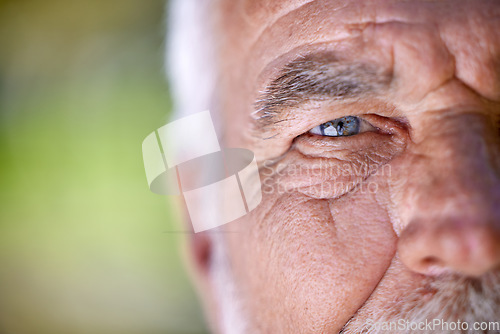 Image of Eyes, vision and old man, face closeup and wisdom with focus, insight and thinking with mockup space. Elderly male person outdoor, perspective or point of view with eyesight, wrinkles and thoughtful