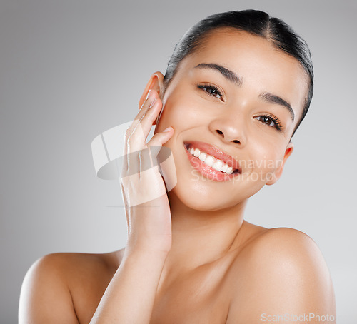 Image of Skincare, natural beauty and happy woman portrait with cosmetics, confidence and dermatology. Female model, smile and youth with a young and happy face closeup and cosmetics treatment in a studio