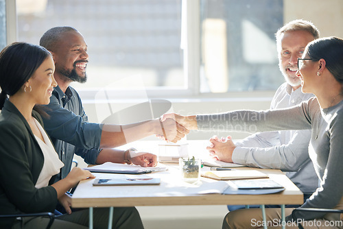 Image of Happy business people, handshake and meeting for agreement, partnership deal and office collaboration. Team shaking hands for success, contract and congratulations of promotion, onboarding and praise