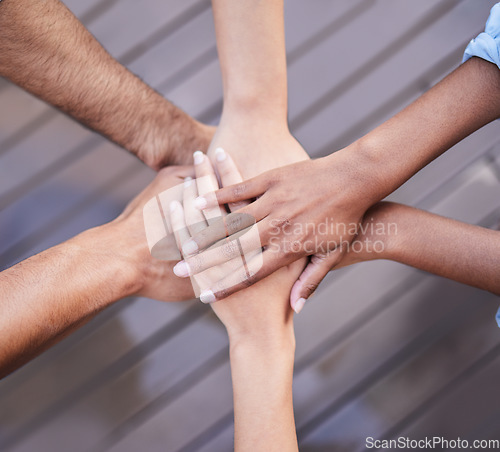 Image of Top view of teamwork, hands and people in circle, support and collaboration of trust, motivation or success. Closeup, community and helping hand of group for goals, mission and partnership in synergy