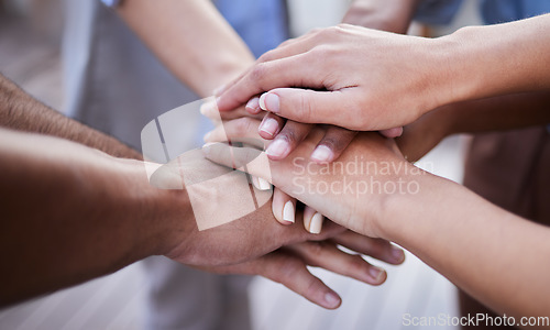 Image of Teamwork, hands and people in collaboration, support and circle of trust for motivation together. Closeup, community and helping hand of group, volunteers and goals for success, mission and synergy