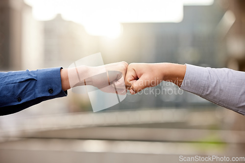 Image of Fist bump, hands and business people with collaboration, partnership or support with goals, teamwork or growth. Closeup, staff or coworkers with hand gesture, unity or trust with cooperation and deal