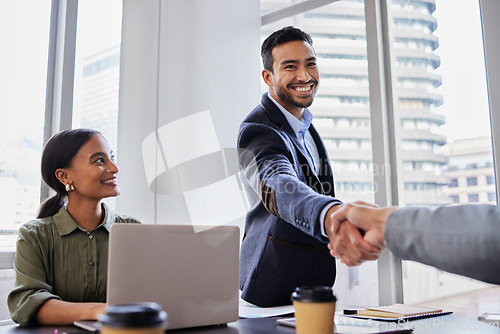 Image of Business meeting, smile and handshake, people with b2b deal or agreement for startup opportunity in office. Hand shake, partnership and welcome, happy businessman shaking hands for onboarding support