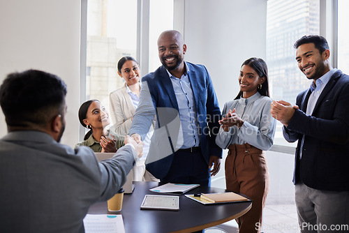 Image of Meeting, smile and handshake with welcome, business people in office and b2b deal or agreement at startup opportunity. Celebrate, partnership and success, happy welcome or promotion and shaking hands