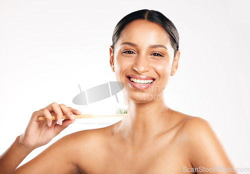 Image of Happy woman, portrait and toothbrush for teeth, dental or clean hygiene against a white studio background. Female person or model with tooth brush and smile in oral, mouth or gum care on mockup space