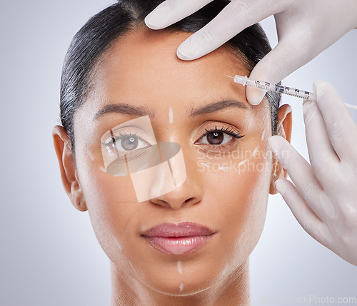 Image of Portrait, aesthetic and botox with woman and injection for plastic surgery, dermatology and beauty. Pattern, filler and medical with model and syringe on grey background for collagen and cosmetics