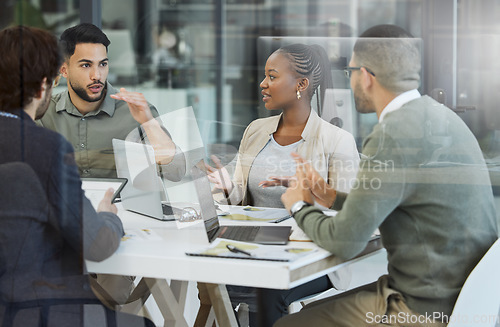 Image of Meeting, collaboration and business people in discussion in the office while working together. Teamwork, planning and group of employees brainstorming with technology for a project in the workplace.