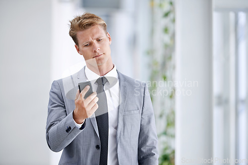 Image of He has a drive for business. A young businessman standing in the workplace.