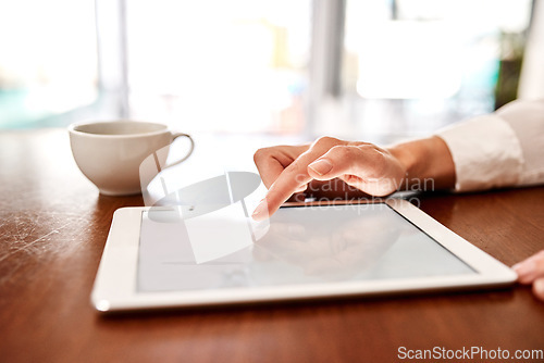 Image of Be smart about the way you work. Closeup shot of an unrecognisable businesswoman using a digital tablet in an office.