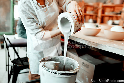 Image of I work with all kinds of clay. Cropped shot of an unrecognizable artisan working in a pottery workshop.